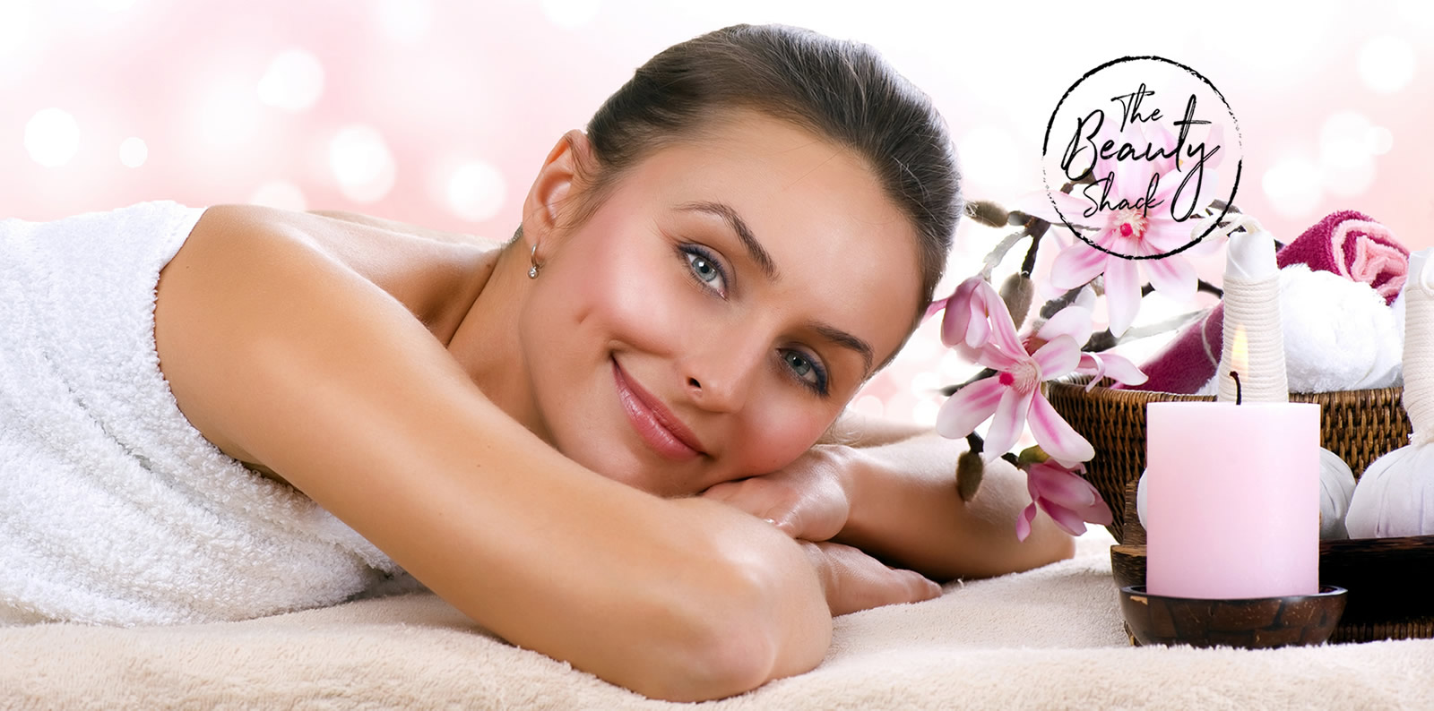 Woman enjoying massage - The Beauty Shack Salon Logo