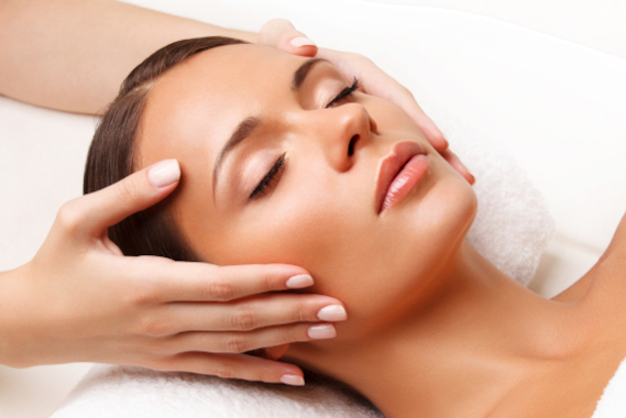 Women having facial massage